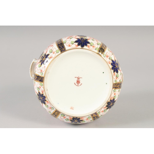 1113 - A ROYAL CROWN DERBY LARGE TWO HANDLED COVERED JAR painted in pattern 1128, date mark 1925.