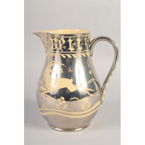 1121 - A 1926 SILVER LUSTRE ANTELOPE JUG. 7.5ins high.