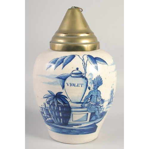 1123 - A DUTCH DELFT VOC LARGE TOBACCO JAR painted in blue with a smoking man seated next to a tobacco jar ... 