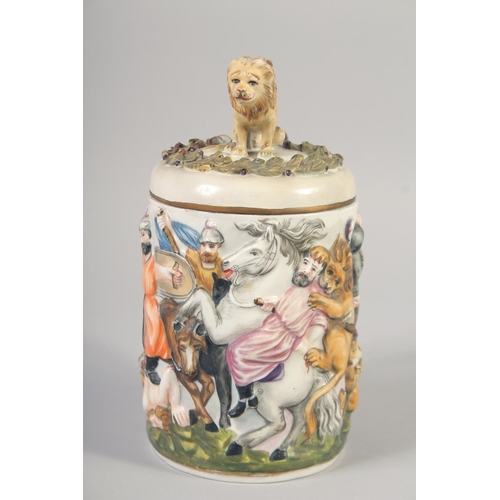 1125 - A CAPODIMONTE PORCELAIN TANKARD AND COVER.