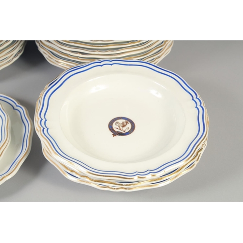 1126 - A GOOD ARMORIAL DANIEL PORCELAIN PART DINNER SERVICE with blue and gilt crest, 