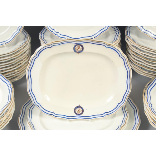 1126 - A GOOD ARMORIAL DANIEL PORCELAIN PART DINNER SERVICE with blue and gilt crest, 