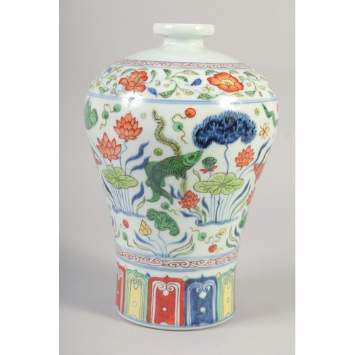 1146 - A CHINESE WUCAI PORCELAIN MEIPING VASE painted with fish and aquatic flora. 29.5cm high.