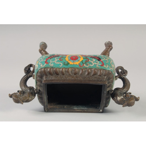 1153 - A CHINESE BRONZE TWIN HANDLED CENSER AND COVER with cloisonne decoration and raised on four elephant... 