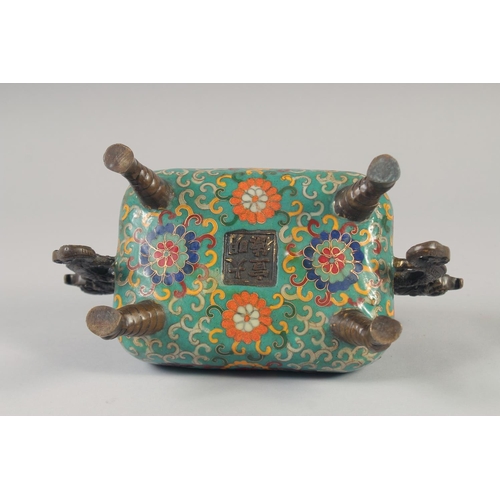 1153 - A CHINESE BRONZE TWIN HANDLED CENSER AND COVER with cloisonne decoration and raised on four elephant... 