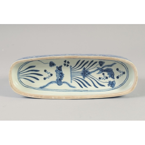 1156 - A CHINESE BLUE AND WHITE PORCELAIN SCRIBES BOX, decorated with fish and aquatic flora. 28cm long.... 