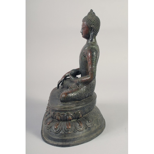 1159 - A LARGE BRONZE SEATED BUDDHA. 12ins long.