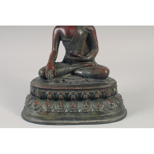 1159 - A LARGE BRONZE SEATED BUDDHA. 12ins long.