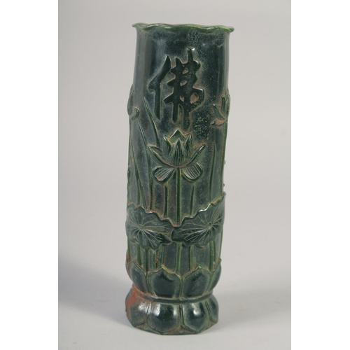 1162 - A TALL CARVED JADE BRUSH POT. 11ins high.