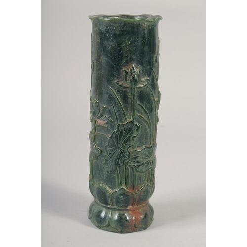 1162 - A TALL CARVED JADE BRUSH POT. 11ins high.