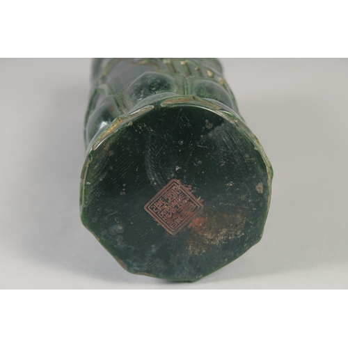 1162 - A TALL CARVED JADE BRUSH POT. 11ins high.