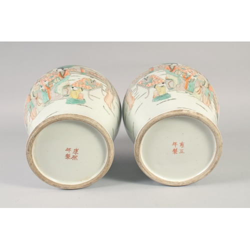 1171 - A PAIR OF CHINESE PORCELAIN TEMPLE JAR AND COVER painted with figures. 16ins high.