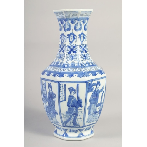 1176 - A CHINESE BLUE AND WHITE PORCELAIN HEXAGONAL VASE. 16ins high.