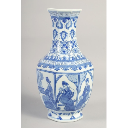 1176 - A CHINESE BLUE AND WHITE PORCELAIN HEXAGONAL VASE. 16ins high.