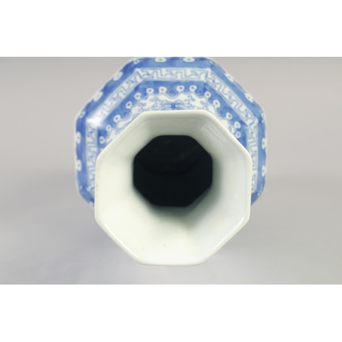 1176 - A CHINESE BLUE AND WHITE PORCELAIN HEXAGONAL VASE. 16ins high.