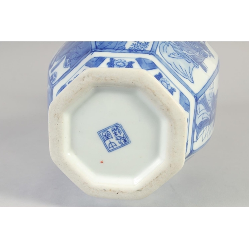 1176 - A CHINESE BLUE AND WHITE PORCELAIN HEXAGONAL VASE. 16ins high.