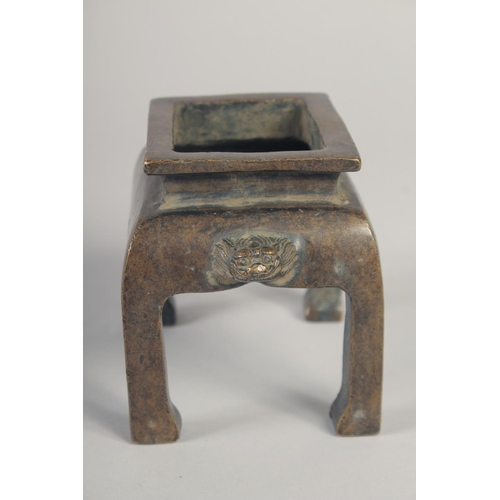 1177 - A GOOD CHINESE CENSER on four legs. 4ins high.