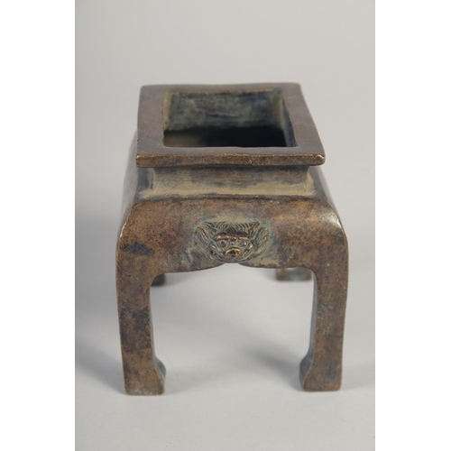 1177 - A GOOD CHINESE CENSER on four legs. 4ins high.