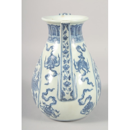 1179 - A CHINESE BLUE AND WHITE PORCELAIN EWER, decorated with phoenix and auspicious symbols, 21.5cm high.