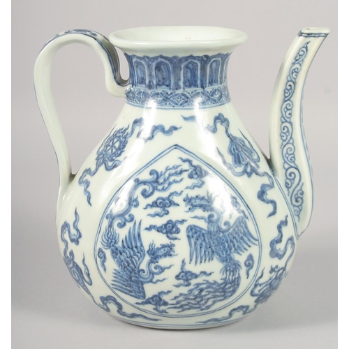 1179 - A CHINESE BLUE AND WHITE PORCELAIN EWER, decorated with phoenix and auspicious symbols, 21.5cm high.