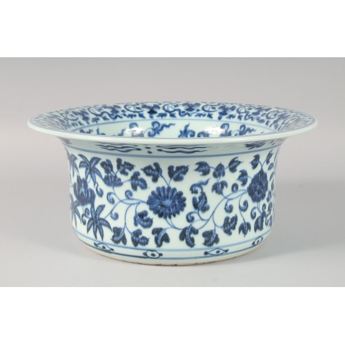 1180 - A CHINESE BLUE AND WHITE PORCELAIN WASH BASIN, decorated with flower heads and vine, the interior ce... 