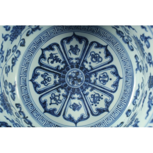 1180 - A CHINESE BLUE AND WHITE PORCELAIN WASH BASIN, decorated with flower heads and vine, the interior ce... 