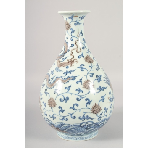 1184 - A CHINESE BLUE AND UNDERGLAZE RED PORCELAIN YUHUCHUNPIN VASE, painted with dragon and phoenix amongs... 