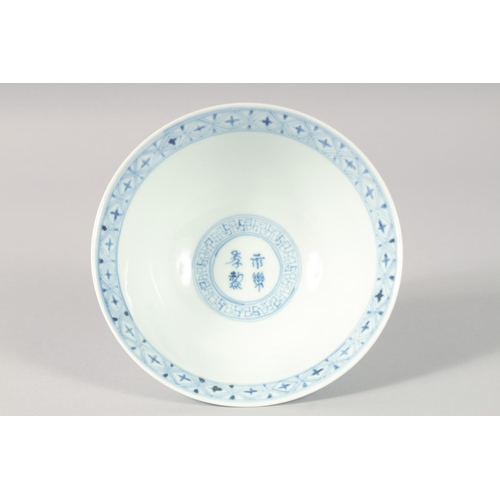 1186 - A CHINESE BLUE AND WHITE PORCELAIN STEM CUP, with a band of characters to the exterior and bearing c... 