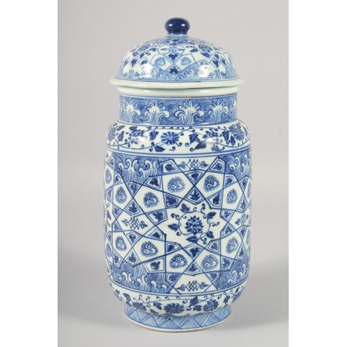 1188 - A CHINESE BLUE AND WHITE PORCELAIN CYLINDRICAL JAR AND COVER, decorated with various floral motifs. ... 