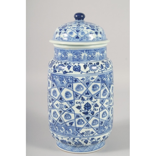 1188 - A CHINESE BLUE AND WHITE PORCELAIN CYLINDRICAL JAR AND COVER, decorated with various floral motifs. ... 