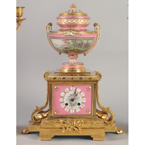 1193 - A SUPERB LOUIS XVI GILT BRONZE AND PINK PORCELAIN CLOCK GARNITURE DE CHEMINEE. The clock with Madame... 