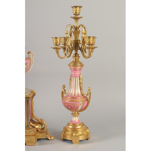 1193 - A SUPERB LOUIS XVI GILT BRONZE AND PINK PORCELAIN CLOCK GARNITURE DE CHEMINEE. The clock with Madame... 