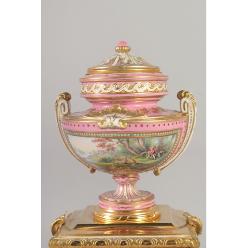 1193 - A SUPERB LOUIS XVI GILT BRONZE AND PINK PORCELAIN CLOCK GARNITURE DE CHEMINEE. The clock with Madame... 