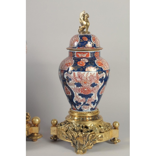 1194 - A SUPERB 19TH CENTURY FRENCH IMARI PORCELAIN AND GILT BRONZE THREE PIECE CLOCK GARNITURE by H LUPPEU... 