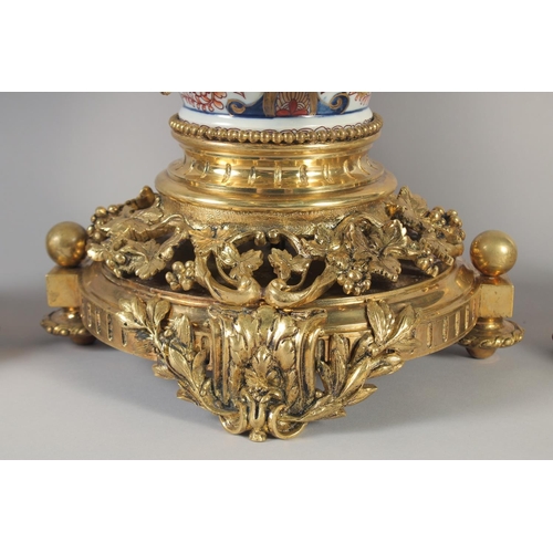 1194 - A SUPERB 19TH CENTURY FRENCH IMARI PORCELAIN AND GILT BRONZE THREE PIECE CLOCK GARNITURE by H LUPPEU... 