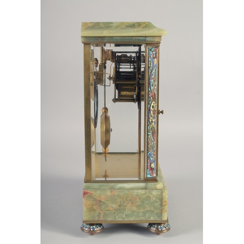 1196 - A GOOD 19TH CENTURY FRENCH ONYX AND CHAMPLEVE ENAMEL CLOCK with glass sides and door with bob pendul... 