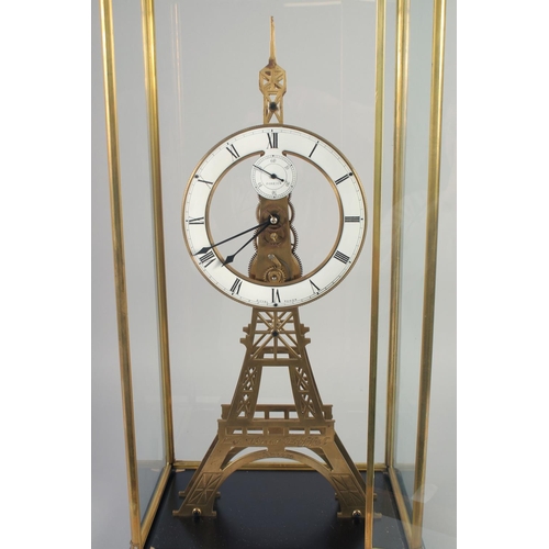 1201 - A LARGE EIFFEL TOWER SKELETON CLOCK with enamel dial, in a glass case.