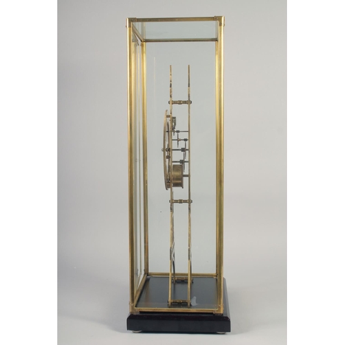 1201 - A LARGE EIFFEL TOWER SKELETON CLOCK with enamel dial, in a glass case.