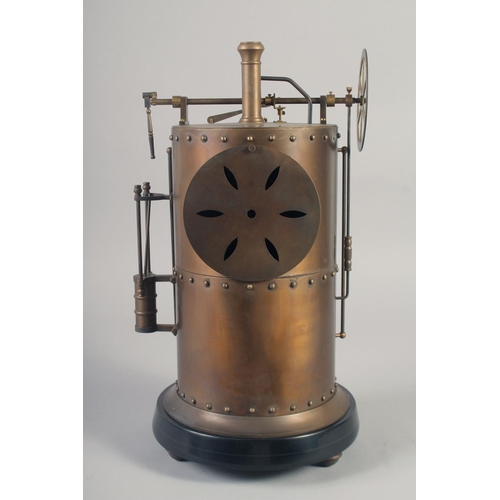 1203 - A BRONZE CYLINDER INDUSTRIAL CLOCK with cream dial. 16ins high.