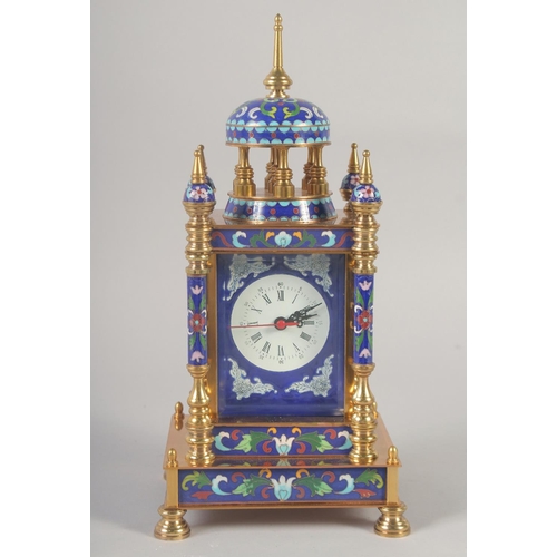 1204 - A BLUE CLOISONNE ENAMEL CLOCK with domed top and four pillars.