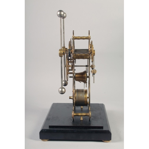 1206 - A BRASS SKELETON CLOCK with two enamel dials in a glass case. 19ins high.