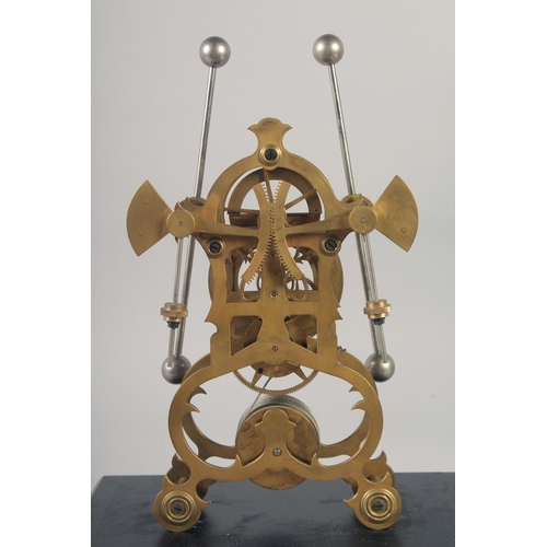 1206 - A BRASS SKELETON CLOCK with two enamel dials in a glass case. 19ins high.