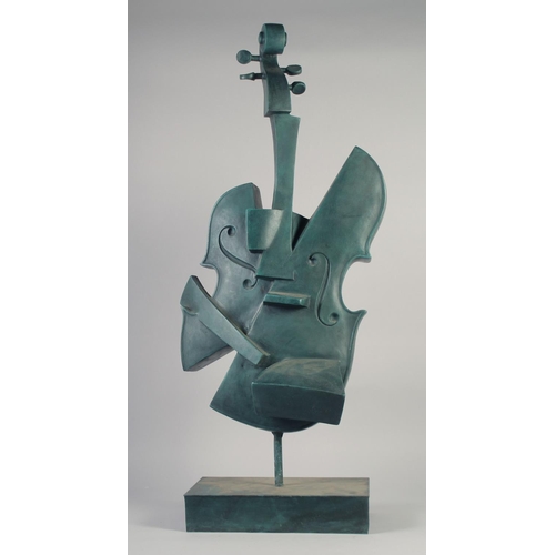 1216 - A LARGE ABSTRACT BRONZE GUITAR. 40ins high.