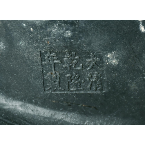 1221 - A LARGE CHINESE BRONZE FIGURE OF GUANVIN sitting atop a wave, holding a sceptre, bearing a six-chara... 