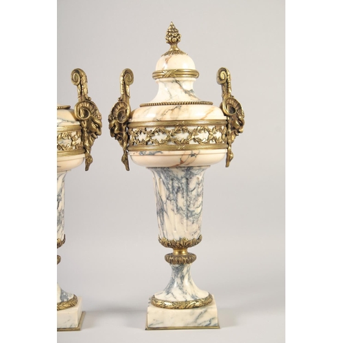 1231 - A VERY GOOD PAIR OF LOUIS XVI MANNER VEINED MARBLE GILT BRONZE CASSOLETTES with pineapple finials an... 