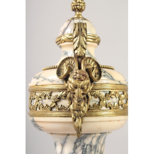 1231 - A VERY GOOD PAIR OF LOUIS XVI MANNER VEINED MARBLE GILT BRONZE CASSOLETTES with pineapple finials an... 