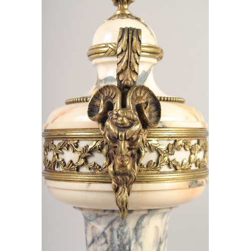 1231 - A VERY GOOD PAIR OF LOUIS XVI MANNER VEINED MARBLE GILT BRONZE CASSOLETTES with pineapple finials an... 