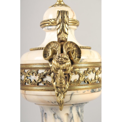 1231 - A VERY GOOD PAIR OF LOUIS XVI MANNER VEINED MARBLE GILT BRONZE CASSOLETTES with pineapple finials an... 