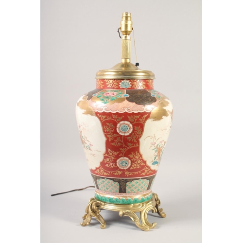 1235 - A GOOD MID 20TH CENTURY KUTANI PORCELAIN LAMP painted with birds with ormolu base. 16ins high.