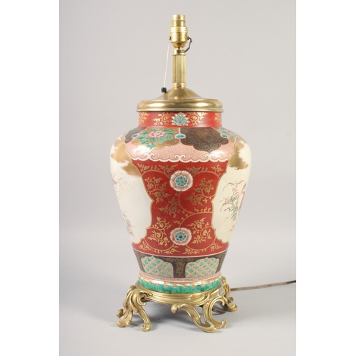 1235 - A GOOD MID 20TH CENTURY KUTANI PORCELAIN LAMP painted with birds with ormolu base. 16ins high.